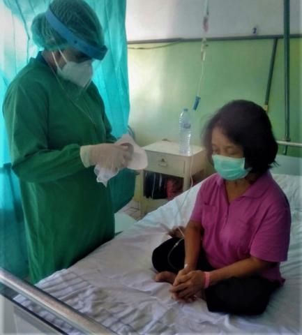 Holy Communion for a patient at Fatima Hospital, Parepare 