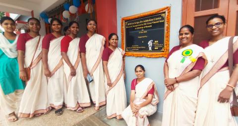 Medical Mission Sisters gather near the new plaque