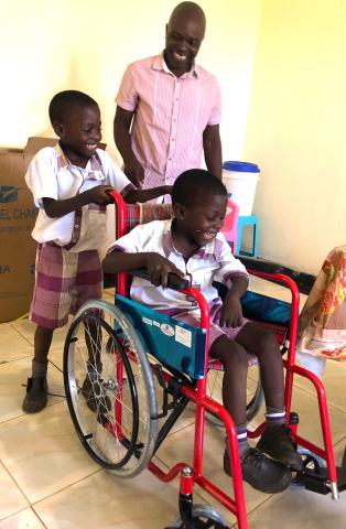 Pius and his twin brother and father, Ang'iya, Kenya