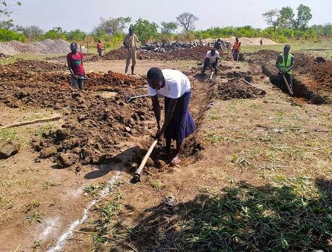 Breaking the ground in Adjumani, Northern Uganda, to start construction of the new centre