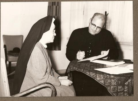 Mother Anna Dengel and Father Heston review the Decretum Laudis, 1959