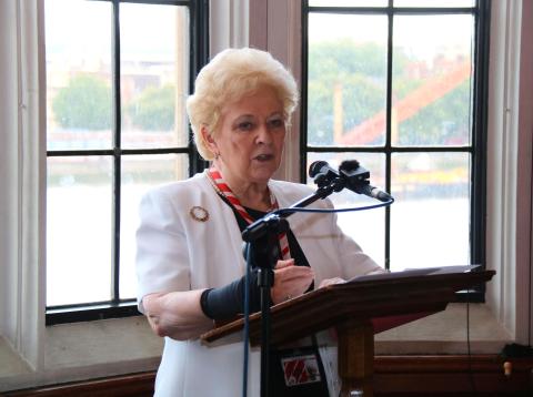 Baroness O'Loan welcomes guests to the event