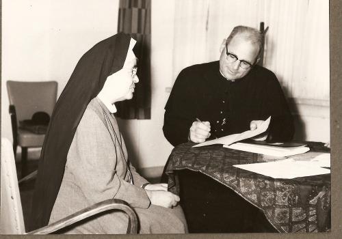 Mother Anna Dengel and Father Heston review the Decretum Laudis, 1959